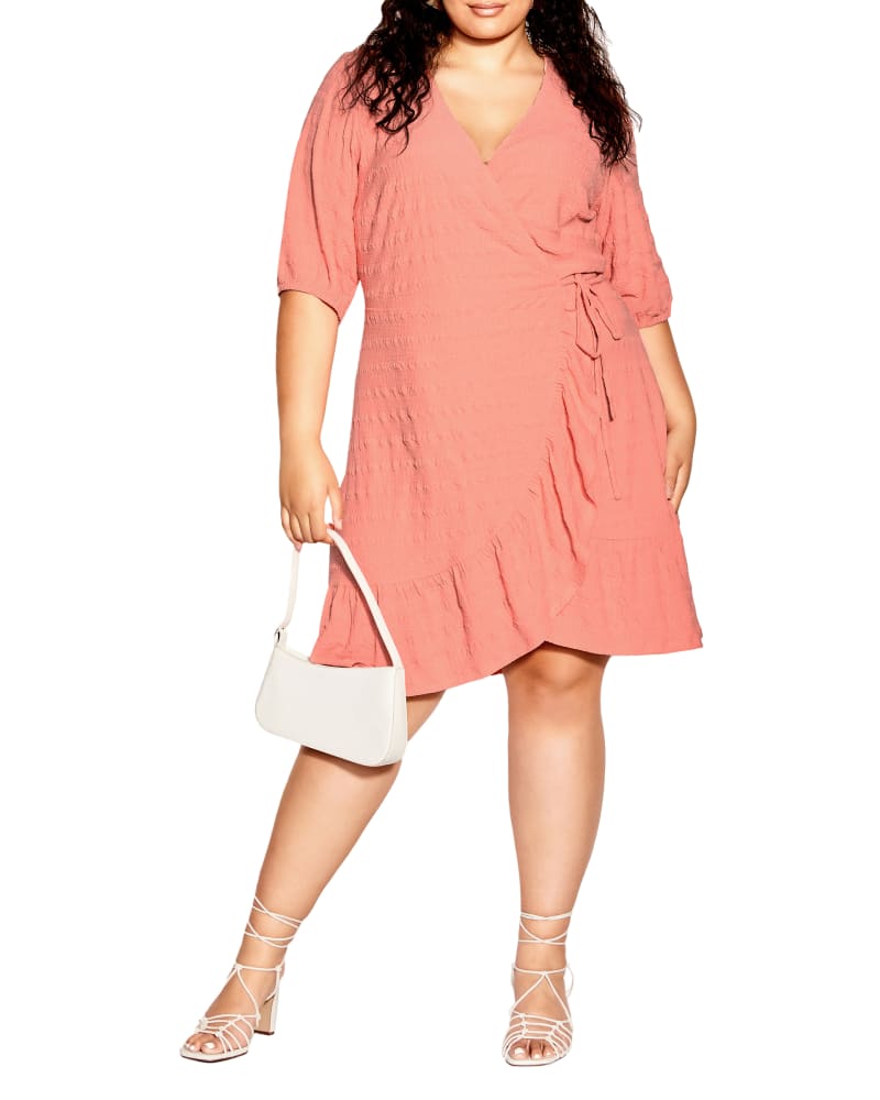 Front of a model wearing a size L DRESS SWEET ROMANCE in Peach by City Chic. | dia_product_style_image_id:293491